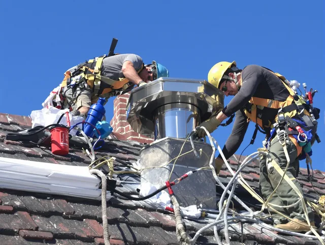 Protective chimney cap installed by Richmond Heights Chimney Sweep in Richmond Heights, OH