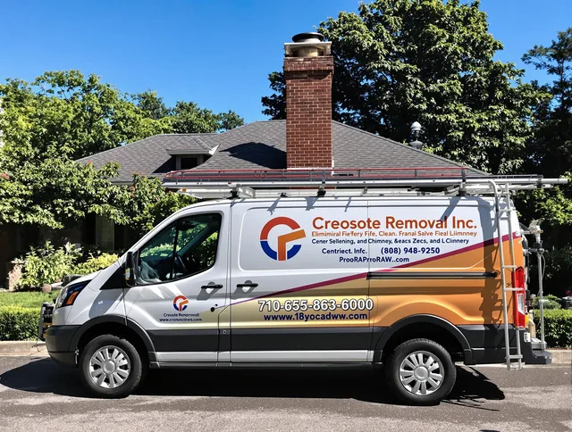Richmond Heights Chimney Sweep technician removing creosote safely in Richmond Heights, OH
